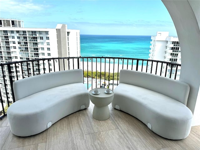 balcony featuring a water view