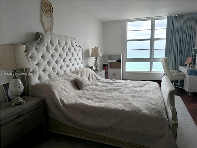 bedroom featuring dark hardwood / wood-style floors