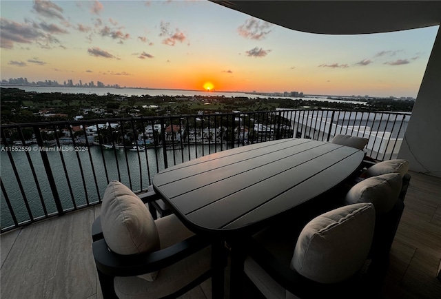 balcony at dusk with a water view