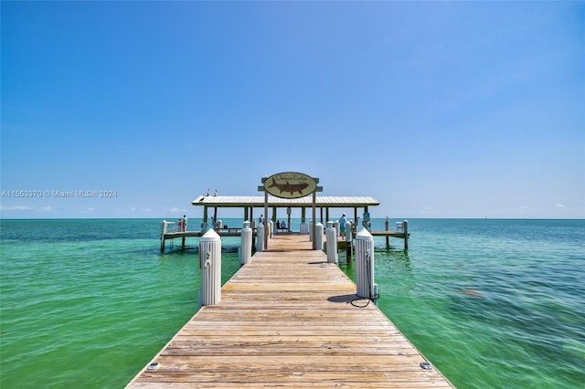 dock area featuring a water view