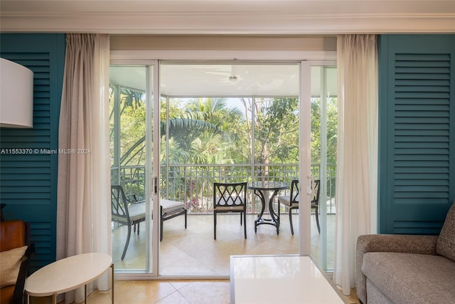 doorway to outside with light tile flooring