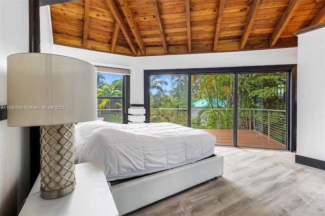 bedroom with access to exterior, lofted ceiling with beams, light hardwood / wood-style floors, and wooden ceiling