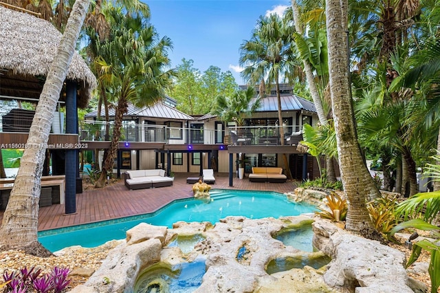 view of pool featuring a patio, an in ground hot tub, and a gazebo