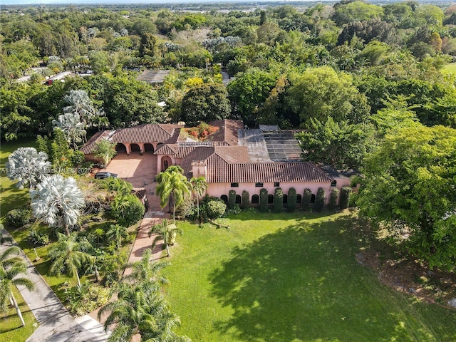 bird's eye view featuring a forest view