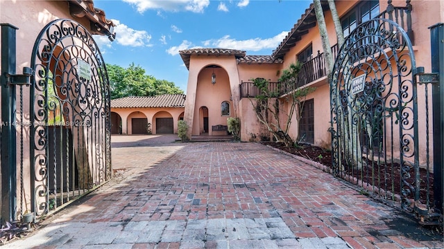 view of gate featuring fence