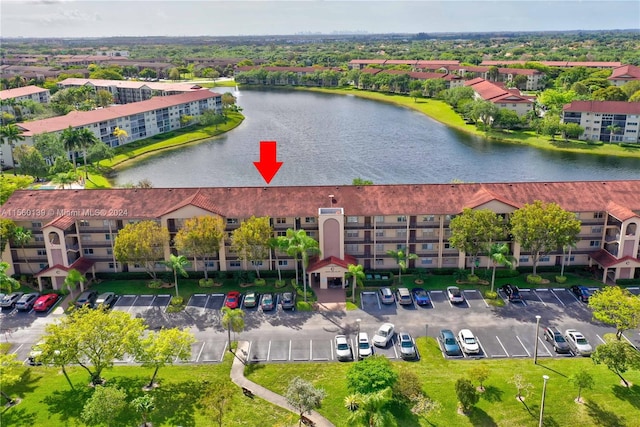 drone / aerial view featuring a water view