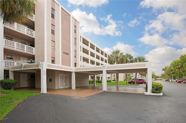 view of property featuring a carport