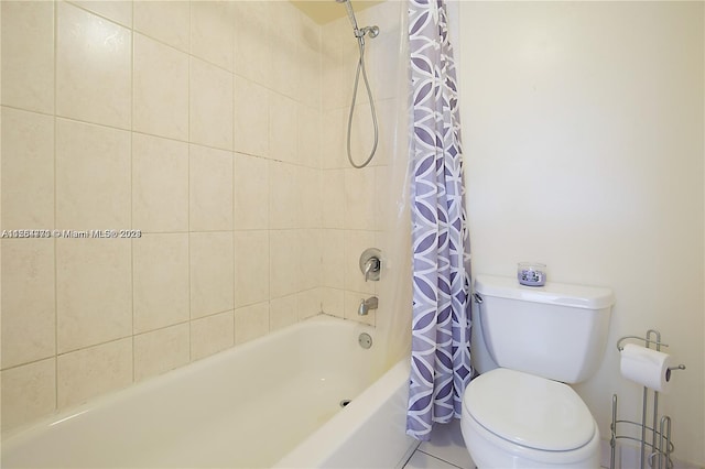 bathroom with toilet and shower / bath combo with shower curtain