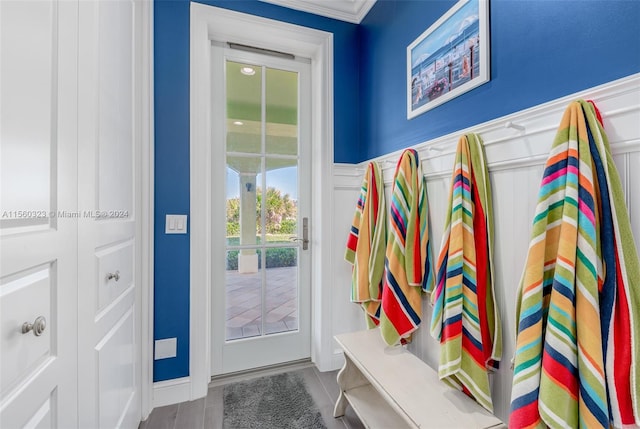 mudroom featuring ornamental molding and hardwood / wood-style flooring