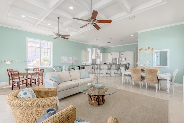 living room featuring coffered ceiling, beamed ceiling, ceiling fan with notable chandelier, crown molding, and light tile patterned floors