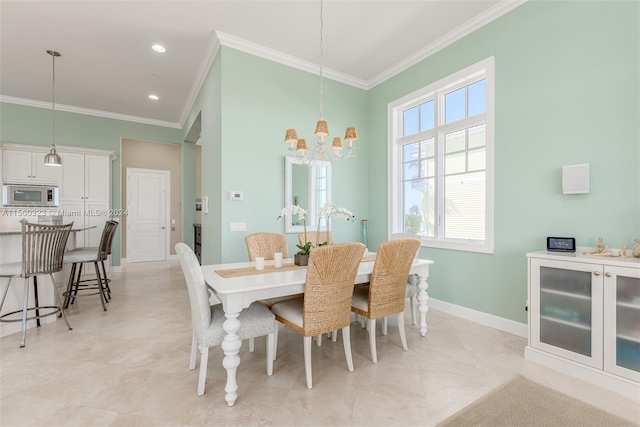 dining room featuring a chandelier and ornamental molding