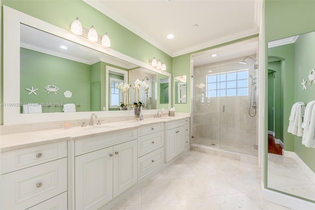 bathroom with walk in shower, ornamental molding, and vanity