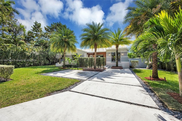 view of front of home with a front yard