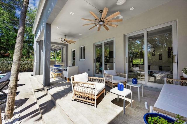 view of patio / terrace featuring an outdoor hangout area and ceiling fan