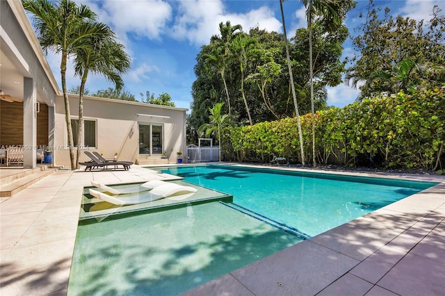 view of pool featuring a patio area