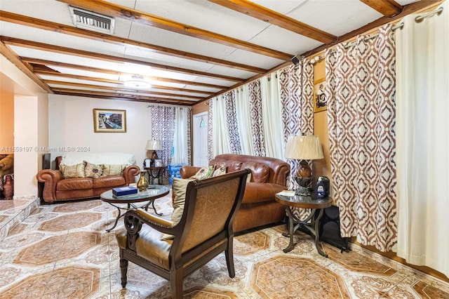 living room with beamed ceiling