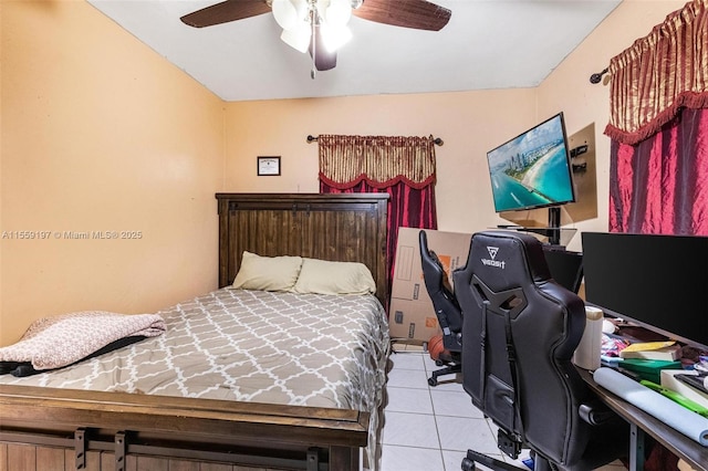 bedroom featuring light tile patterned floors and ceiling fan