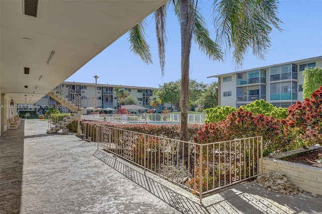 view of property's community featuring stairs