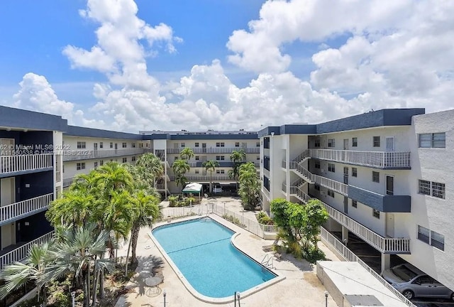 view of pool featuring a patio