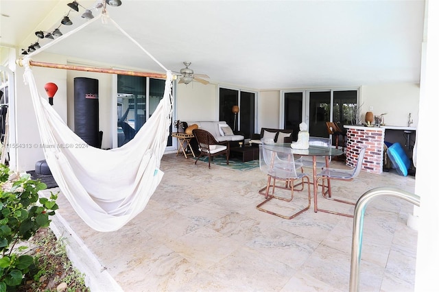 view of patio with ceiling fan