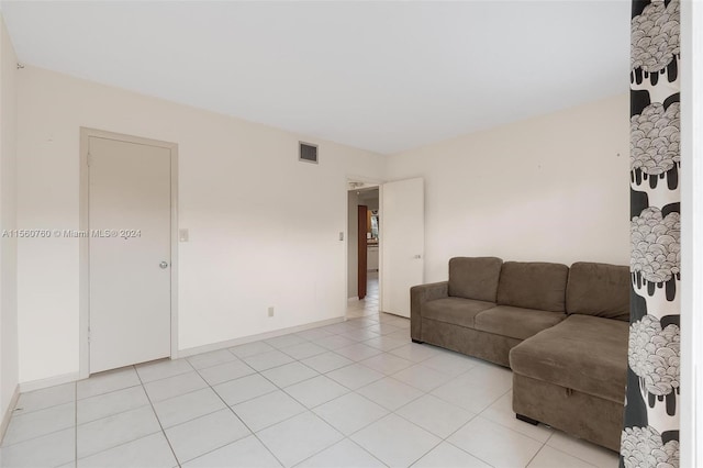 living room featuring light tile patterned floors