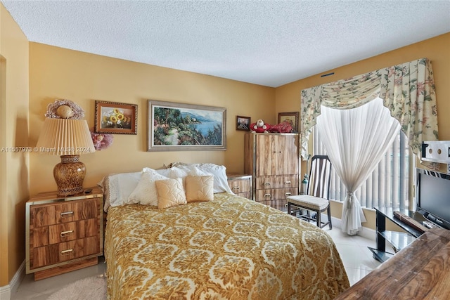 bedroom with a textured ceiling