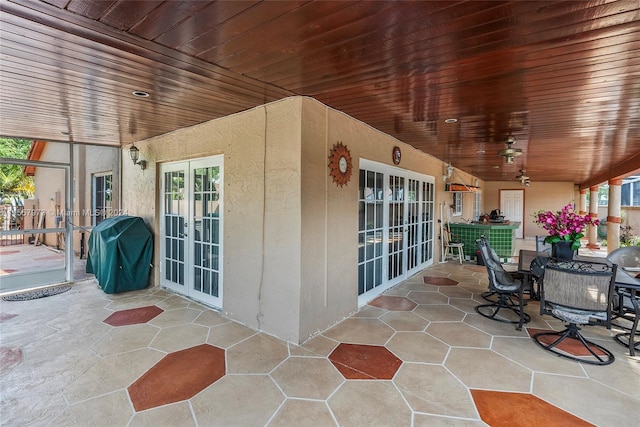 view of patio / terrace with french doors and a grill