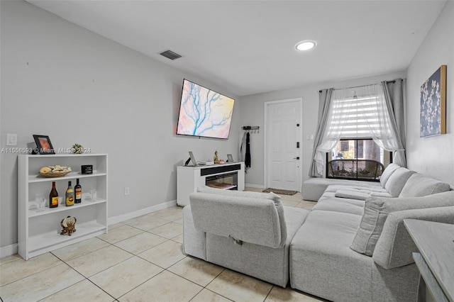 living room featuring light tile flooring