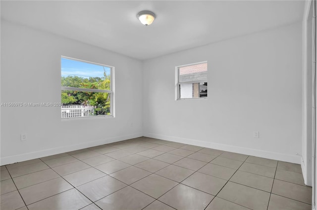 view of tiled spare room