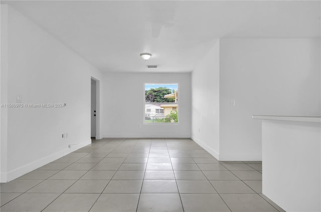 view of tiled spare room