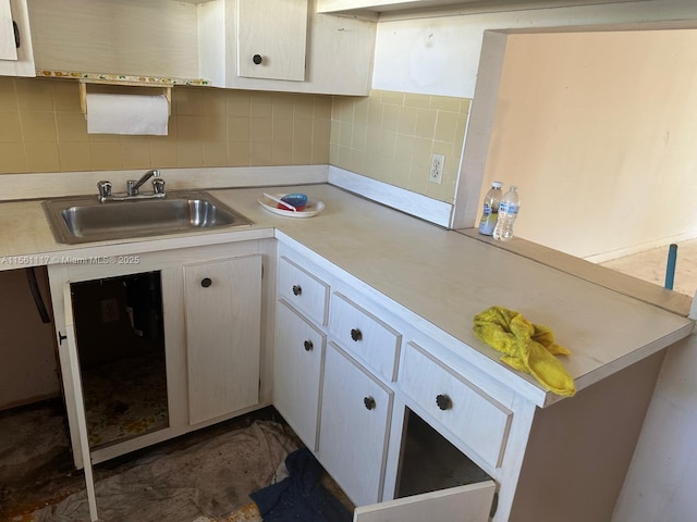 kitchen with sink and decorative backsplash