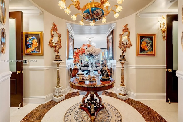 corridor featuring a notable chandelier, ornamental molding, and light tile floors