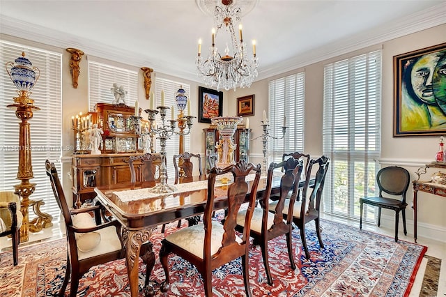 dining space featuring ornamental molding and a chandelier