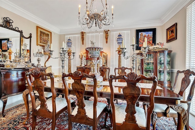 dining room featuring a notable chandelier and crown molding