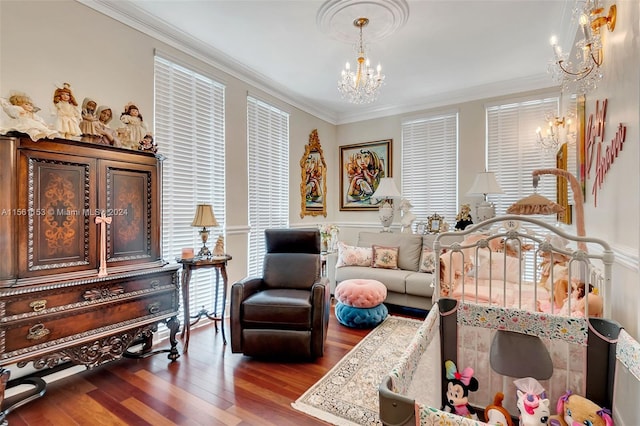 bedroom with crown molding, dark hardwood / wood-style floors, and an inviting chandelier