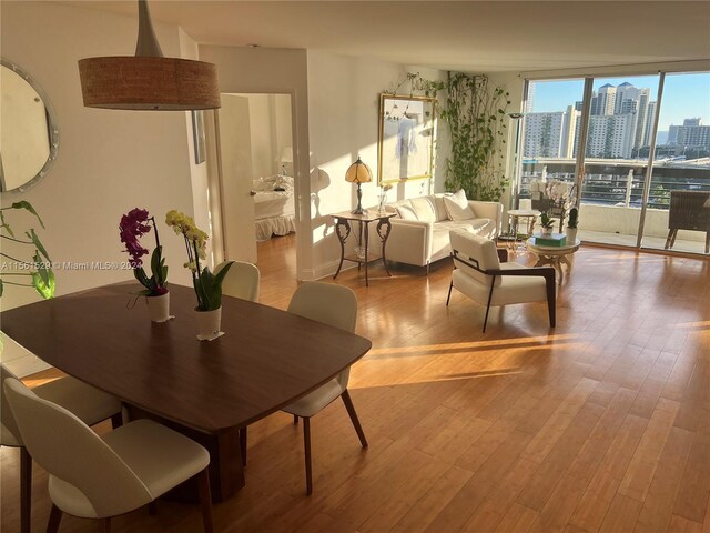 dining area featuring hardwood / wood-style flooring