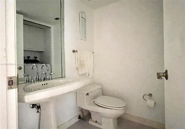 bathroom featuring toilet