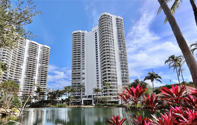 view of building exterior with a water view