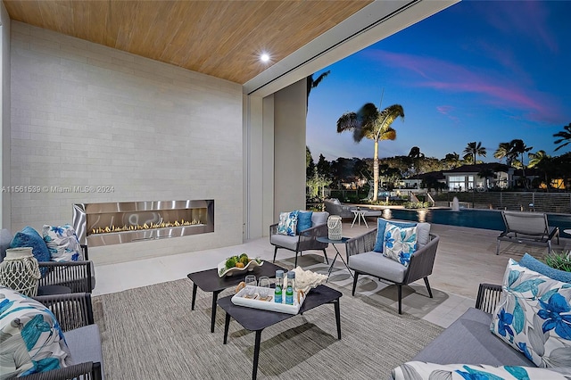 patio terrace at dusk with outdoor lounge area