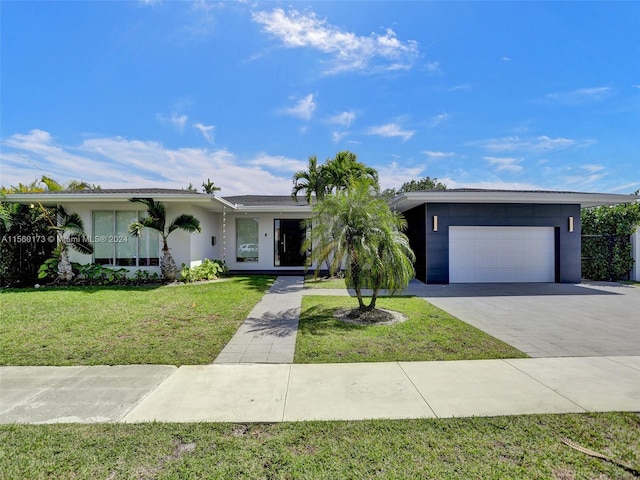 ranch-style house with a front lawn and a garage