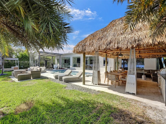 exterior space with an outdoor hangout area and a patio area