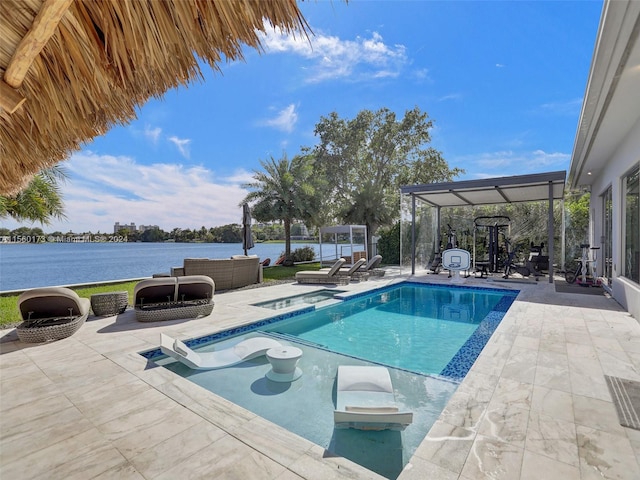 view of pool featuring outdoor lounge area and a patio