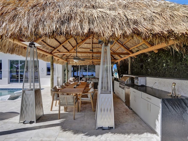 view of patio / terrace with a gazebo and area for grilling