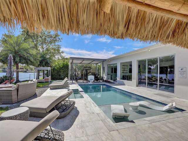 view of swimming pool featuring a patio area