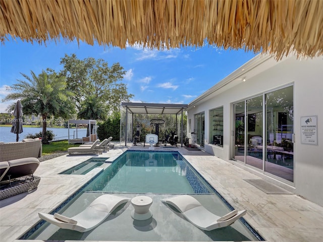 view of swimming pool featuring a patio area