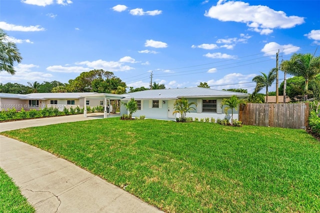 ranch-style house featuring a front lawn