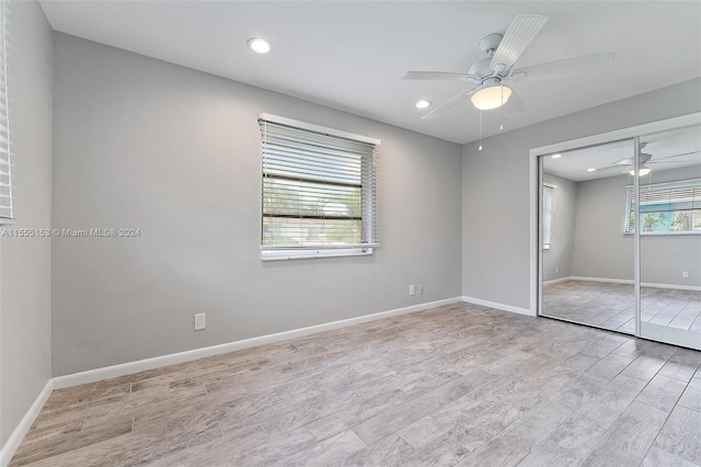 unfurnished bedroom featuring a closet, ceiling fan, and light hardwood / wood-style floors