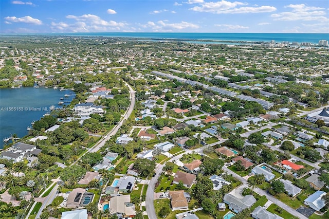 drone / aerial view with a water view