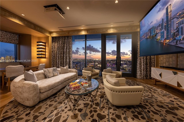 living room featuring recessed lighting and wood finished floors