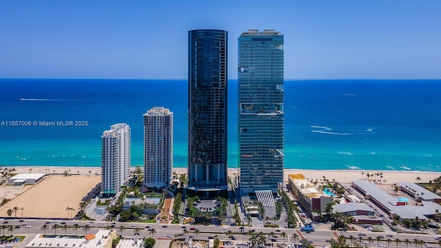 aerial view featuring a beach view and a water view